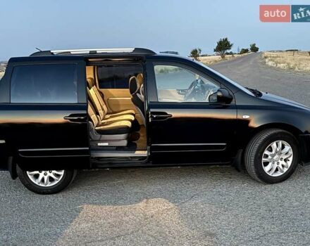 Черный Киа Карнивал, объемом двигателя 2.9 л и пробегом 292 тыс. км за 7300 $, фото 45 на Automoto.ua