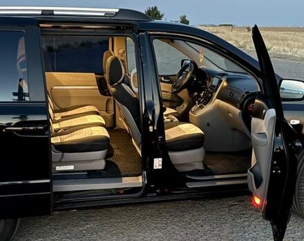 Черный Киа Карнивал, объемом двигателя 2.9 л и пробегом 292 тыс. км за 7300 $, фото 43 на Automoto.ua