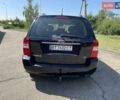 Черный Киа Карнивал, объемом двигателя 2.9 л и пробегом 222 тыс. км за 6300 $, фото 3 на Automoto.ua