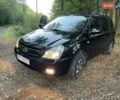 Черный Киа Карнивал, объемом двигателя 2.9 л и пробегом 223 тыс. км за 5700 $, фото 1 на Automoto.ua