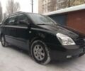 Черный Киа Карнивал, объемом двигателя 2.9 л и пробегом 141 тыс. км за 9500 $, фото 1 на Automoto.ua