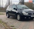 Черный Киа Карнивал, объемом двигателя 2.9 л и пробегом 184 тыс. км за 10450 $, фото 1 на Automoto.ua