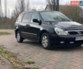 Черный Киа Карнивал, объемом двигателя 2.9 л и пробегом 184 тыс. км за 10450 $, фото 1 на Automoto.ua
