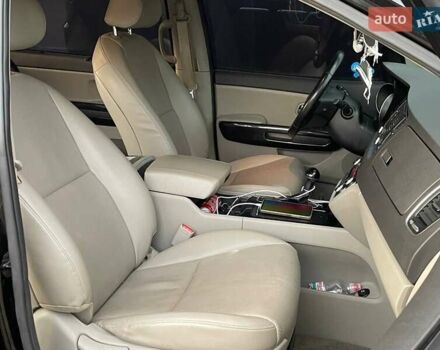 Черный Киа Карнивал, объемом двигателя 2.2 л и пробегом 295 тыс. км за 15900 $, фото 9 на Automoto.ua