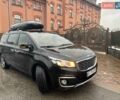 Киа Карнивал 2014 в Киеве на Automoto.ua Черный Киа Карнивал, объемом двигателя 2.2 л и пробегом 290 тыс. км за 18500 $, фото 1 на Automoto.ua