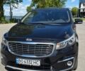 Черный Киа Карнивал, объемом двигателя 2.2 л и пробегом 180 тыс. км за 18500 $, фото 1 на Automoto.ua