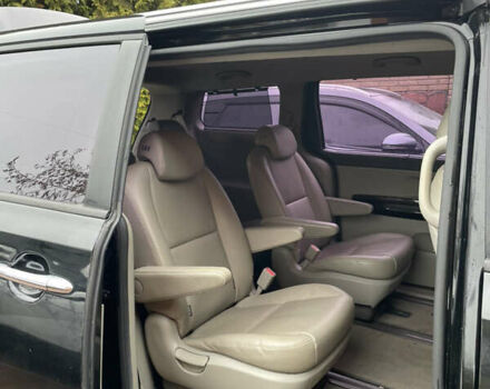 Черный Киа Карнивал, объемом двигателя 2.2 л и пробегом 220 тыс. км за 14100 $, фото 12 на Automoto.ua