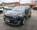 Черный Киа Карнивал, объемом двигателя 2.2 л и пробегом 263 тыс. км за 21500 $, фото 1 на Automoto.ua