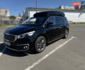 Черный Киа Карнивал, объемом двигателя 2.2 л и пробегом 180 тыс. км за 23500 $, фото 1 на Automoto.ua