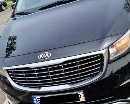 Черный Киа Карнивал, объемом двигателя 2.2 л и пробегом 250 тыс. км за 23550 $, фото 1 на Automoto.ua