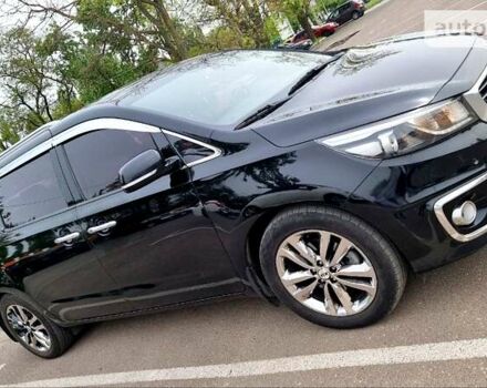 Черный Киа Карнивал, объемом двигателя 2.2 л и пробегом 250 тыс. км за 23550 $, фото 5 на Automoto.ua