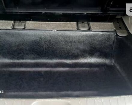 Черный Киа Карнивал, объемом двигателя 2.2 л и пробегом 250 тыс. км за 23550 $, фото 49 на Automoto.ua