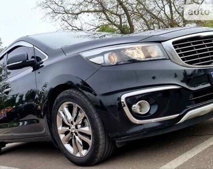 Черный Киа Карнивал, объемом двигателя 2.2 л и пробегом 250 тыс. км за 23550 $, фото 3 на Automoto.ua