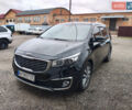 Черный Киа Карнивал, объемом двигателя 2.2 л и пробегом 263 тыс. км за 21500 $, фото 1 на Automoto.ua