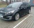 Черный Киа Карнивал, объемом двигателя 2.2 л и пробегом 300 тыс. км за 28800 $, фото 1 на Automoto.ua