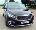 Черный Киа Карнивал, объемом двигателя 2.2 л и пробегом 241 тыс. км за 16500 $, фото 1 на Automoto.ua