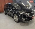 Черный Киа Карнивал, объемом двигателя 2.2 л и пробегом 299 тыс. км за 16500 $, фото 1 на Automoto.ua