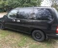 Черный Киа Карнивал, объемом двигателя 2.9 л и пробегом 320 тыс. км за 2200 $, фото 2 на Automoto.ua