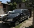 Черный Киа Карнивал, объемом двигателя 2.9 л и пробегом 335 тыс. км за 4501 $, фото 1 на Automoto.ua