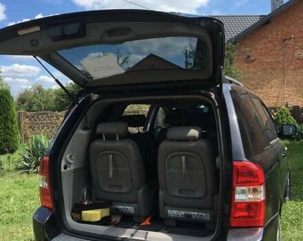 Черный Киа Карнивал, объемом двигателя 2.9 л и пробегом 290 тыс. км за 7000 $, фото 7 на Automoto.ua