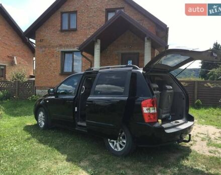 Черный Киа Карнивал, объемом двигателя 2.9 л и пробегом 290 тыс. км за 7000 $, фото 5 на Automoto.ua