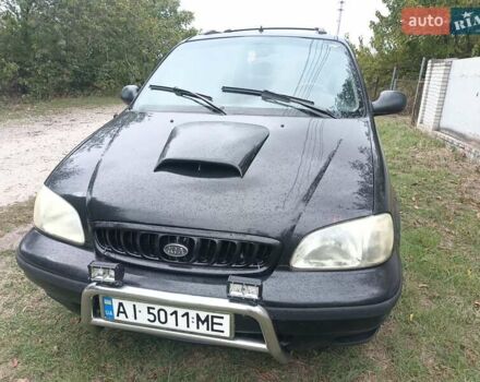 Черный Киа Карнивал, объемом двигателя 2.9 л и пробегом 320 тыс. км за 2200 $, фото 1 на Automoto.ua