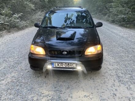 Киа Карнивал 2000 в Житомире на Automoto.ua Черный Киа Карнивал, объемом двигателя 2.9 л и пробегом 235 тыс. км за 1800 $, фото 1 на Automoto.ua