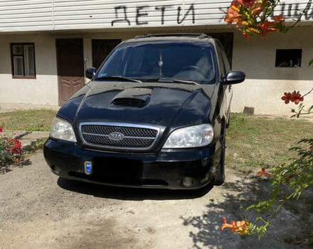 Черный Киа Карнивал, объемом двигателя 2.9 л и пробегом 339 тыс. км за 2700 $, фото 1 на Automoto.ua