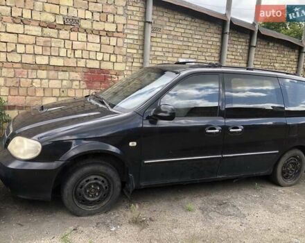 Черный Киа Карнивал, объемом двигателя 2.9 л и пробегом 200 тыс. км за 2000 $, фото 1 на Automoto.ua