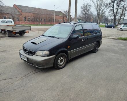 Чорний Кіа Карнівал, об'ємом двигуна 2.9 л та пробігом 260 тис. км за 1500 $, фото 1 на Automoto.ua