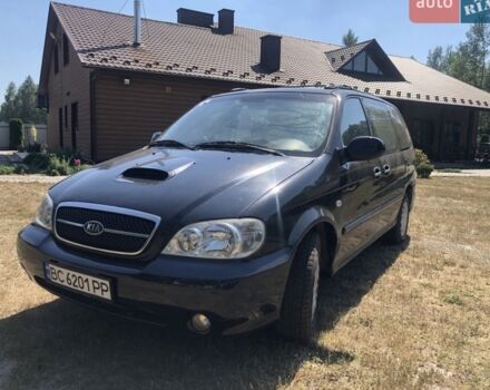 Черный Киа Карнивал, объемом двигателя 2.9 л и пробегом 330 тыс. км за 4200 $, фото 1 на Automoto.ua