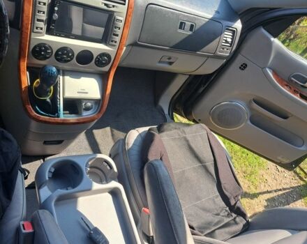 Черный Киа Карнивал, объемом двигателя 2.9 л и пробегом 320 тыс. км за 5000 $, фото 1 на Automoto.ua