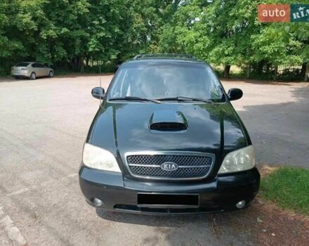 Черный Киа Карнивал, объемом двигателя 2.9 л и пробегом 270 тыс. км за 4000 $, фото 1 на Automoto.ua
