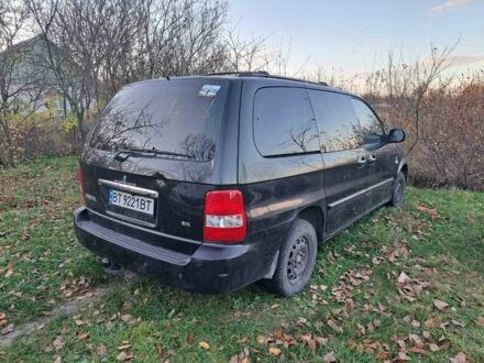 Чорний Кіа Карнівал, об'ємом двигуна 2.9 л та пробігом 300 тис. км за 4600 $, фото 1 на Automoto.ua