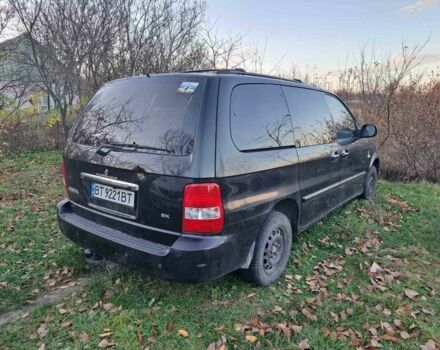 Черный Киа Карнивал, объемом двигателя 2.9 л и пробегом 300 тыс. км за 4600 $, фото 1 на Automoto.ua