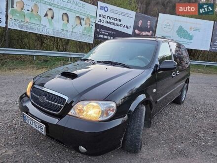 Черный Киа Карнивал, объемом двигателя 2.9 л и пробегом 299 тыс. км за 4400 $, фото 1 на Automoto.ua