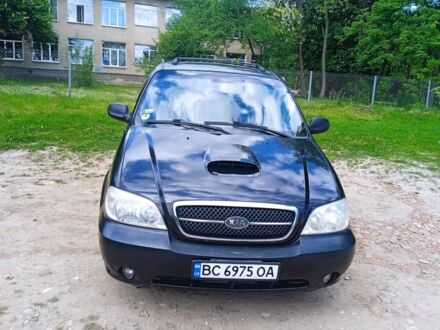 Черный Киа Карнивал, объемом двигателя 2.9 л и пробегом 270 тыс. км за 3900 $, фото 1 на Automoto.ua