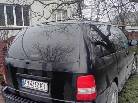 Чорний Кіа Карнівал, об'ємом двигуна 2.8 л та пробігом 300 тис. км за 3800 $, фото 1 на Automoto.ua