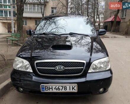 Черный Киа Карнивал, объемом двигателя 2.9 л и пробегом 300 тыс. км за 5200 $, фото 1 на Automoto.ua