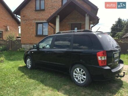 Черный Киа Карнивал, объемом двигателя 2.9 л и пробегом 290 тыс. км за 7000 $, фото 1 на Automoto.ua