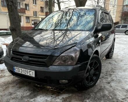 Черный Киа Карнивал, объемом двигателя 2.7 л и пробегом 255 тыс. км за 4450 $, фото 1 на Automoto.ua