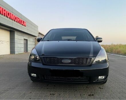 Чорний Кіа Карнівал, об'ємом двигуна 2.2 л та пробігом 240 тис. км за 12000 $, фото 1 на Automoto.ua