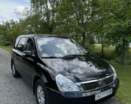 Черный Киа Карнивал, объемом двигателя 2.9 л и пробегом 295 тыс. км за 11500 $, фото 1 на Automoto.ua