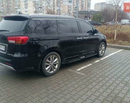 Черный Киа Карнивал, объемом двигателя 2.2 л и пробегом 300 тыс. км за 28800 $, фото 1 на Automoto.ua