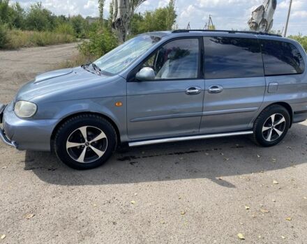 Коричневый Киа Карнивал, объемом двигателя 2.9 л и пробегом 320 тыс. км за 2700 $, фото 1 на Automoto.ua