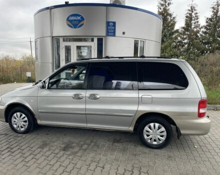 Коричневый Киа Карнивал, объемом двигателя 2.9 л и пробегом 250 тыс. км за 1899 $, фото 2 на Automoto.ua