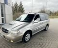 Коричневый Киа Карнивал, объемом двигателя 2.9 л и пробегом 250 тыс. км за 1899 $, фото 1 на Automoto.ua