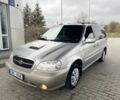 Коричневый Киа Карнивал, объемом двигателя 2.9 л и пробегом 250 тыс. км за 1899 $, фото 1 на Automoto.ua