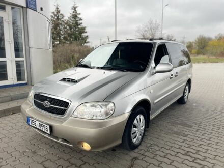 Коричневый Киа Карнивал, объемом двигателя 2.9 л и пробегом 250 тыс. км за 1899 $, фото 1 на Automoto.ua