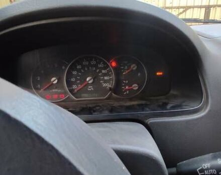 Красный Киа Карнивал, объемом двигателя 2.9 л и пробегом 170 тыс. км за 2500 $, фото 12 на Automoto.ua